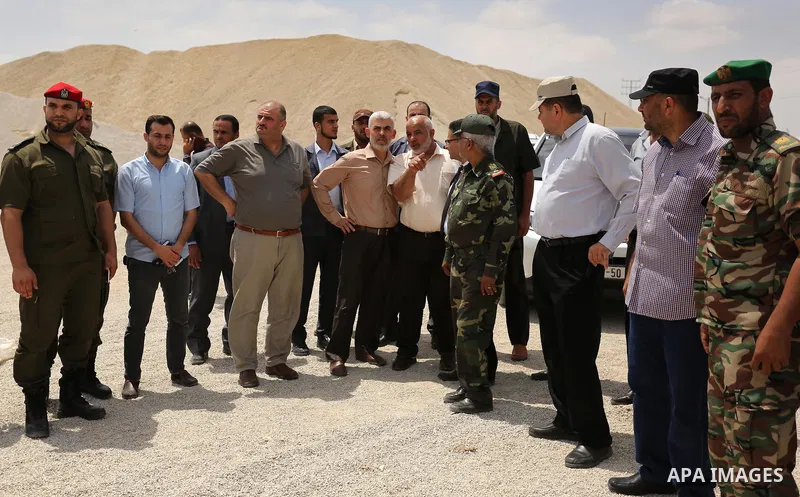 Yahya Sinwar the new leader of the Hamas Islamist movement in the Gaza Strip inspects a section of the border with Egypt, in the southern Gaza strip town of Rafah, on July 6, 2017. The buffer zone is expected to extend f...