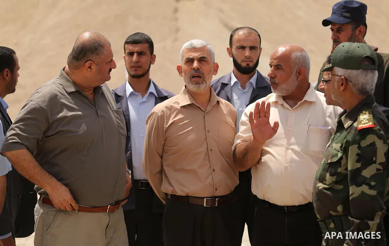 Yahya Sinwar the new leader of the Hamas Islamist movement in the Gaza Strip inspects a section of the border with Egypt, in the southern Gaza strip town of Rafah, on July 6, 2017. The buffer zone is expected to extend f...