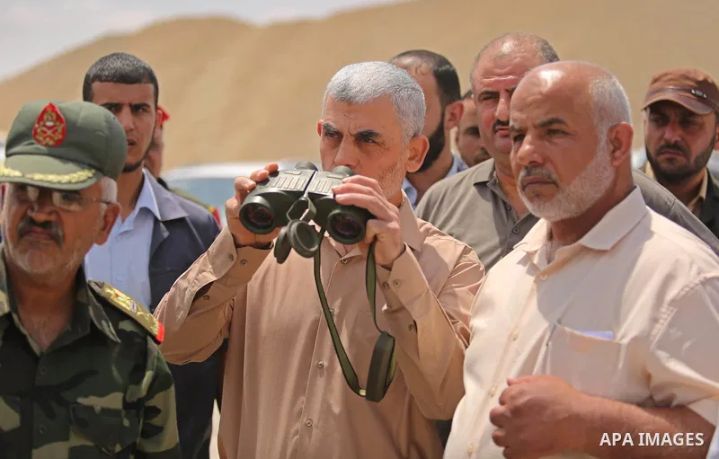 Yahya Sinwar the new leader of the Hamas Islamist movement in the Gaza Strip inspects a section of the border with Egypt, in the southern Gaza strip town of Rafah, on July 6, 2017. The buffer zone is expected to extend f...