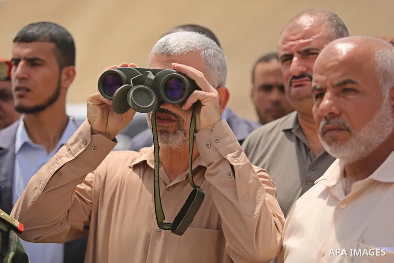 Yahya Sinwar the new leader of the Hamas Islamist movement in the Gaza Strip inspects a section of the border with Egypt, in the southern Gaza strip town of Rafah, on July 6, 2017. The buffer zone is expected to extend f...