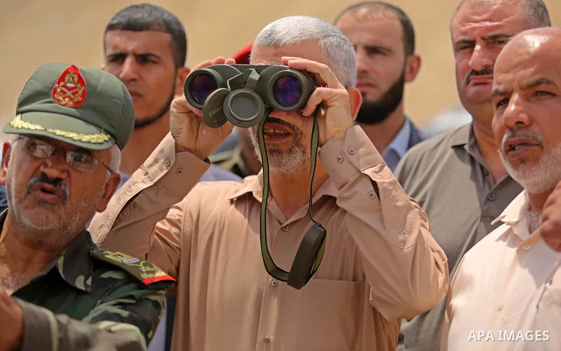 Yahya Sinwar the new leader of the Hamas Islamist movement in the Gaza Strip inspects a section of the border with Egypt, in the southern Gaza strip town of Rafah, on July 6, 2017. The buffer zone is expected to extend f...