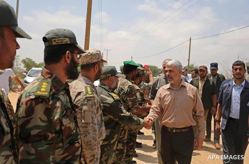Yahya Sinwar the new leader of the Hamas Islamist movement in the Gaza Strip inspects a section of the border with Egypt, in the southern Gaza strip town of Rafah, on July 6, 2017. The buffer zone is expected to extend f...