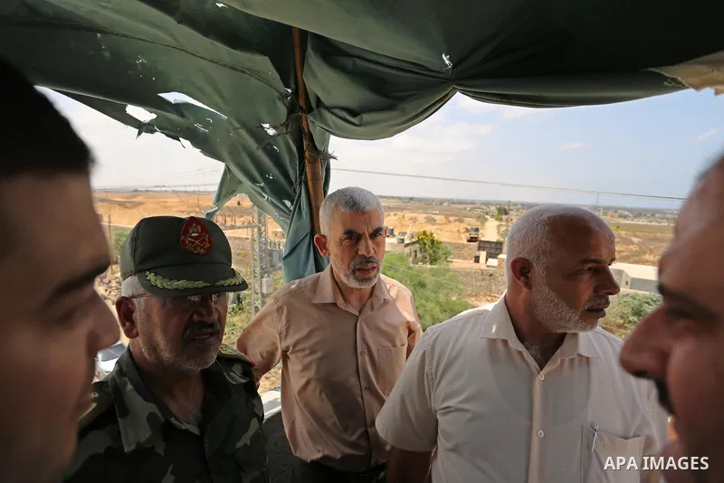 Yahya Sinwar the new leader of the Hamas Islamist movement in the Gaza Strip inspects a section of the border with Egypt, in the southern Gaza strip town of Rafah, on July 6, 2017. The buffer zone is expected to extend f...