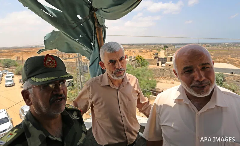 Yahya Sinwar the new leader of the Hamas Islamist movement in the Gaza Strip inspects a section of the border with Egypt, in the southern Gaza strip town of Rafah, on July 6, 2017. The buffer zone is expected to extend f...