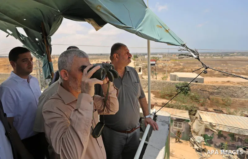 Yahya Sinwar the new leader of the Hamas Islamist movement in the Gaza Strip inspects a section of the border with Egypt, in the southern Gaza strip town of Rafah, on July 6, 2017. The buffer zone is expected to extend f...