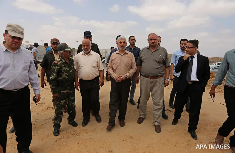 Yahya Sinwar the new leader of the Hamas Islamist movement in the Gaza Strip inspects a section of the border with Egypt, in the southern Gaza strip town of Rafah, on July 6, 2017. The buffer zone is expected to extend f...