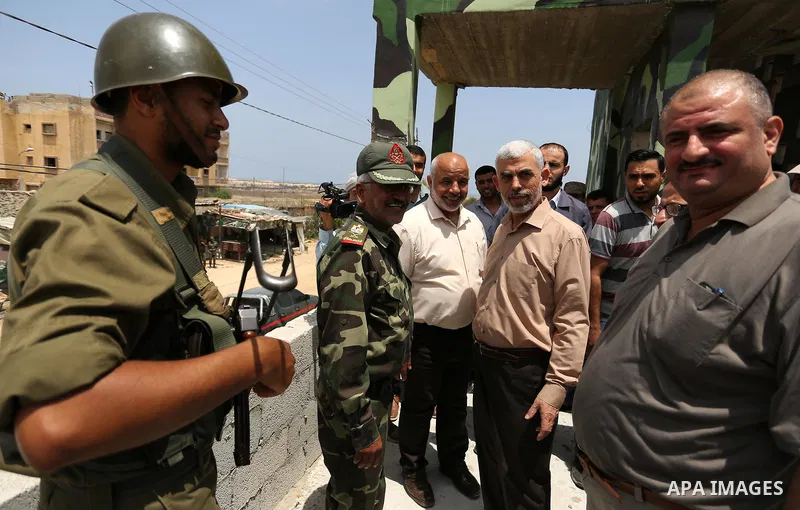 Yahya Sinwar the new leader of the Hamas Islamist movement in the Gaza Strip inspects a section of the border with Egypt, in the southern Gaza strip town of Rafah, on July 6, 2017. The buffer zone is expected to extend f...
