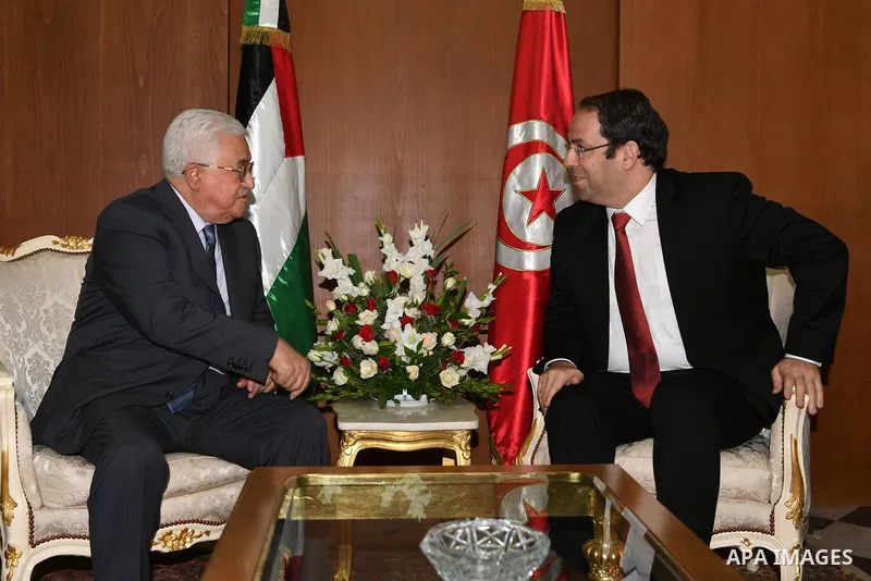 Palestinian President Mahmoud Abbas meets with Tunisian prime minister Youssef Chahed in Tunis, on July 7, 2017. Abbas is on 2 day official visit to Tunisia. Photo by Thaer Ganaim