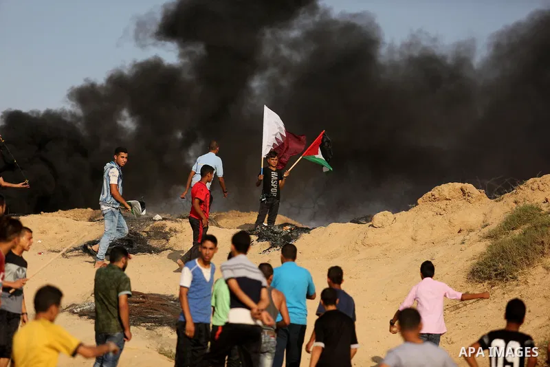 Palestinian protesters clash with Israeli security forces near the border between Israel and Central Gaza Strip July 7, 2017. Photo by Ashraf Amra