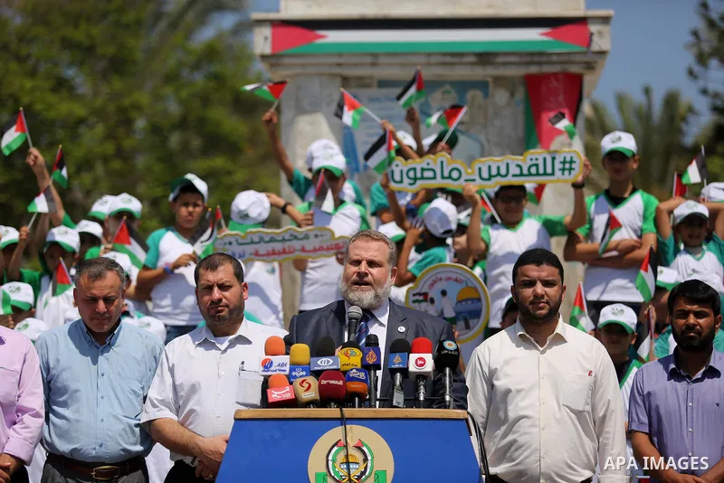 Senior Hamas Leader Osama Al Mazin, speaks during a press conference to announce the start of summer camps organized by the Hamas movement in Gaza city on July 8, 2017. Photo by Ashraf Amra