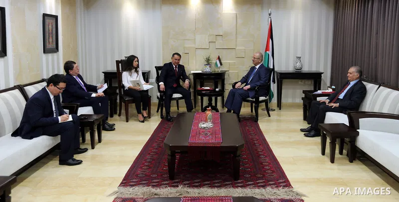 Palestinian Prime Minister Rami Hamdallah meets with deputy Minister of Foreign Affairs of Kazakhstan Akylbek Kamaldinov, at his office, in the West Bank city of Ramallah, on July 08, 2017. Photo by Prime Minister Office