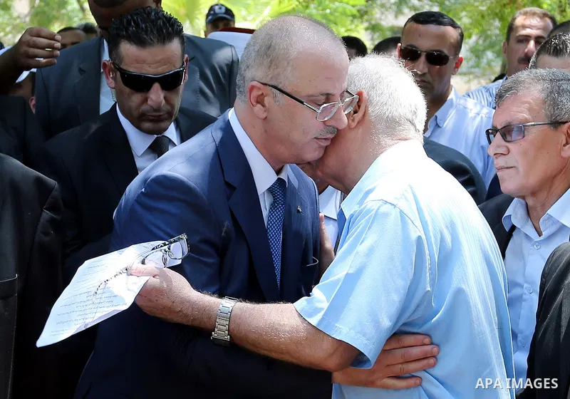 Palestinian Prime Minister Rami Hamdallah attends the funeral of Governor of Tubas Governorate, Rabhi al-Khandakji in the West Bank city of Tulkarem, on July 8, 2017. Photo by Prime Minister Office