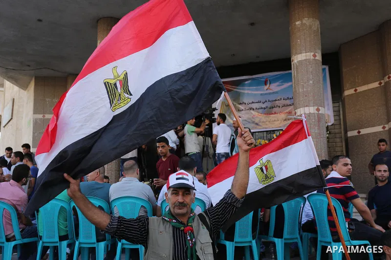 Palestinian gather in to a mourning tent in Gaza City on July 8, 2017 set up for people to pay their respects to the Egyptian soldiers, who were killed a day earlier in the restive Sinai Peninsula in an attack by the Isl...