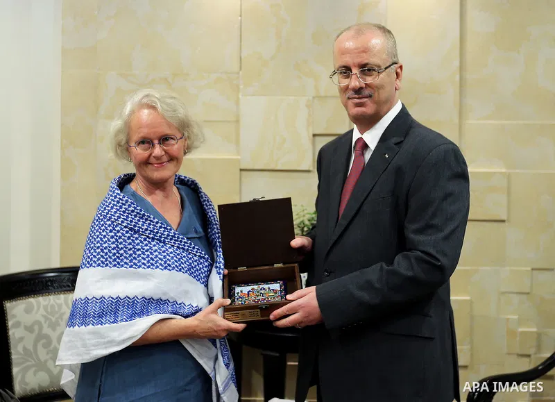 Palestinian Prime Minister Rami Hamdallah meets with the representative of Finland to Palestine, Pericolisa Costella, at his office in the West Bank city of Ramallah, on July 09, 2017. Photo by Prime Minister Office