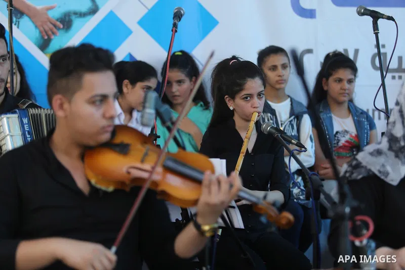 Palestinians enjoy as part of the activities proposed during a Summer Fun Weeks 2017 organised by the United Nations, in Gaza city, on July 9, 2017. Photo by Ashraf Amra