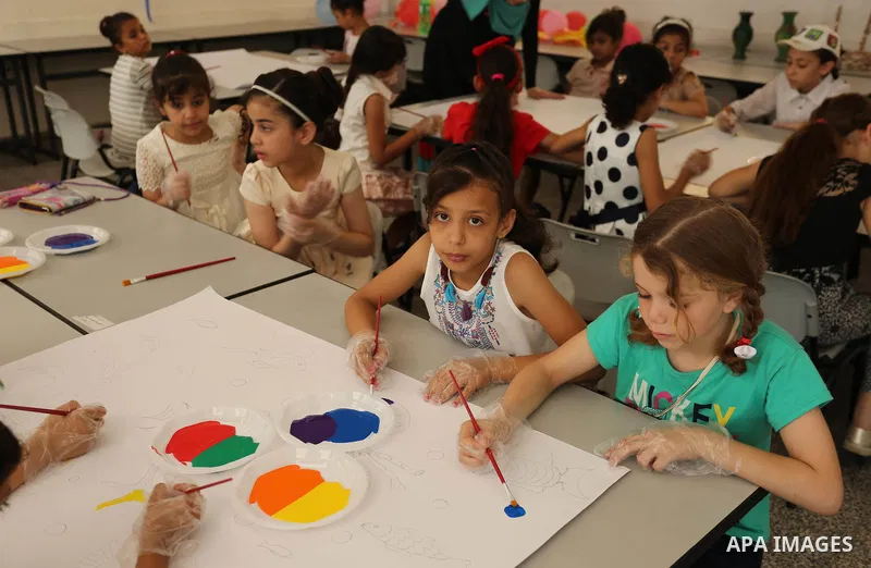 Palestinians enjoy as part of the activities proposed during a Summer Fun Weeks 2017 organised by the United Nations, in Gaza city, on July 9, 2017. Photo by Ashraf Amra