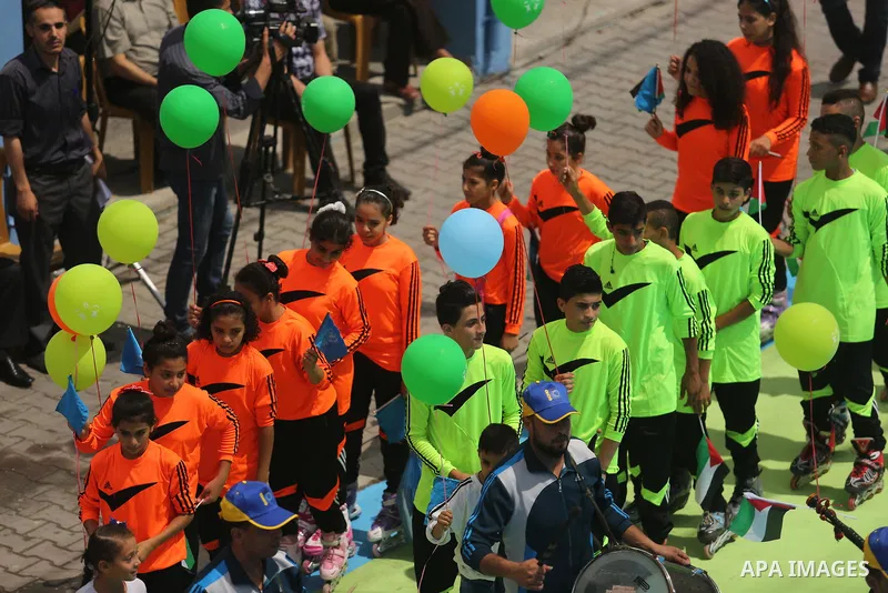 Palestinians enjoy as part of the activities proposed during a Summer Fun Weeks 2017 organised by the United Nations, in Gaza city, on July 9, 2017. Photo by Ashraf Amra