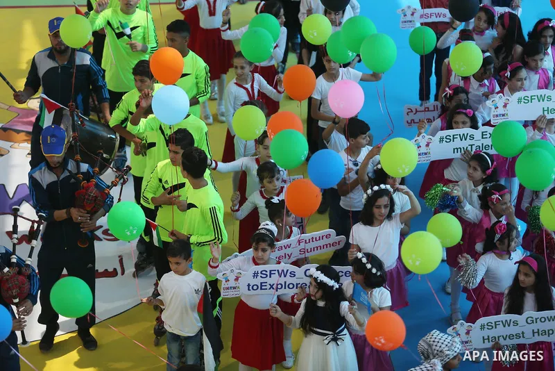 Palestinians enjoy as part of the activities proposed during a Summer Fun Weeks 2017 organised by the United Nations, in Gaza city, on July 9, 2017. Photo by Ashraf Amra