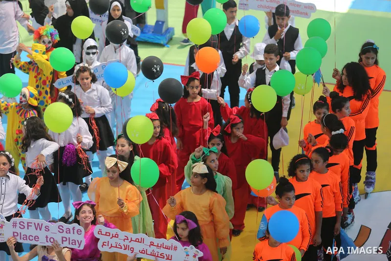 Palestinians enjoy as part of the activities proposed during a Summer Fun Weeks 2017 organised by the United Nations, in Gaza city, on July 9, 2017. Photo by Ashraf Amra