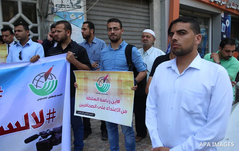 Palestinian journalists take part in a protest against the decision of Palestinian Authority's public prosecutor to block 11 Palestinian news websites in the Israeli-occupied West Bank, in Gaza city on July 10, 2017. Pho...