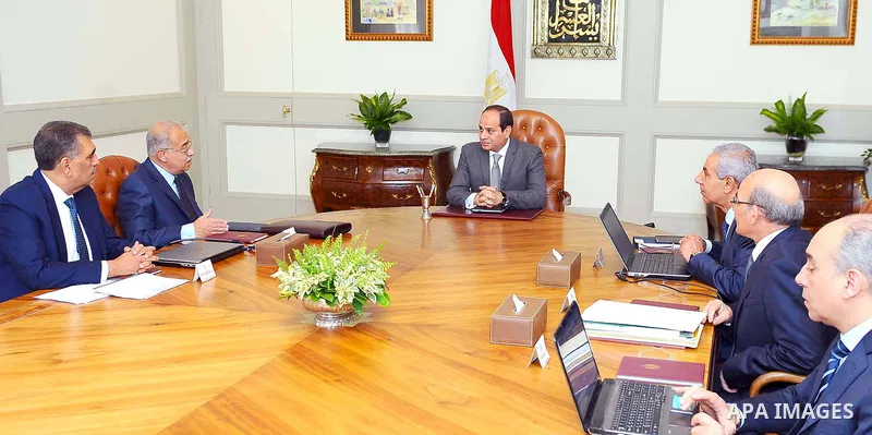 Egyptian President Abdel Fattah al-Sisi, meets with Prime Minister Sharif Ismail, in Cairo, Egypt, on July 10, 2017. Photo by Egyptian President Office