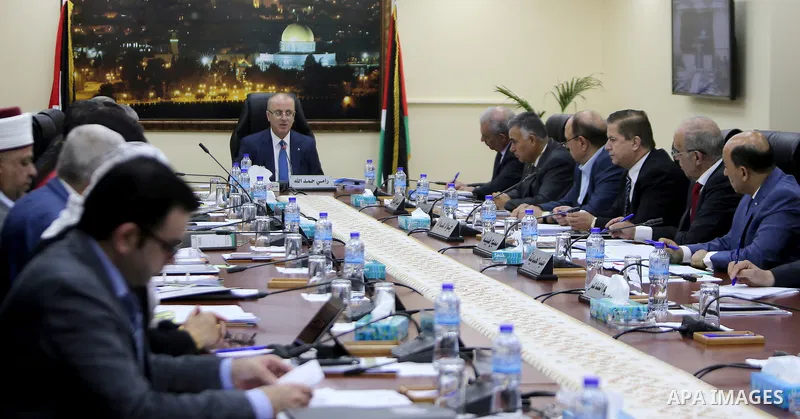 Palestinian Prime Minister Rami hamadallah chairs the Palestinian council meeting in the West Bank city of Ramallah on July 11, 2017. Photo by Prime Minister Office