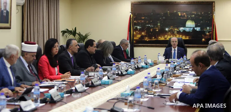 Palestinian Prime Minister Rami hamadallah chairs the Palestinian council meeting in the West Bank city of Ramallah on July 11, 2017. Photo by Prime Minister Office