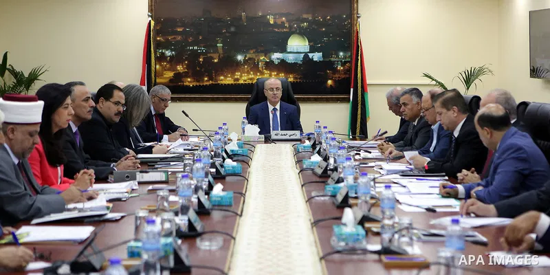 Palestinian Prime Minister Rami hamadallah chairs the Palestinian council meeting in the West Bank city of Ramallah on July 11, 2017. Photo by Prime Minister Office