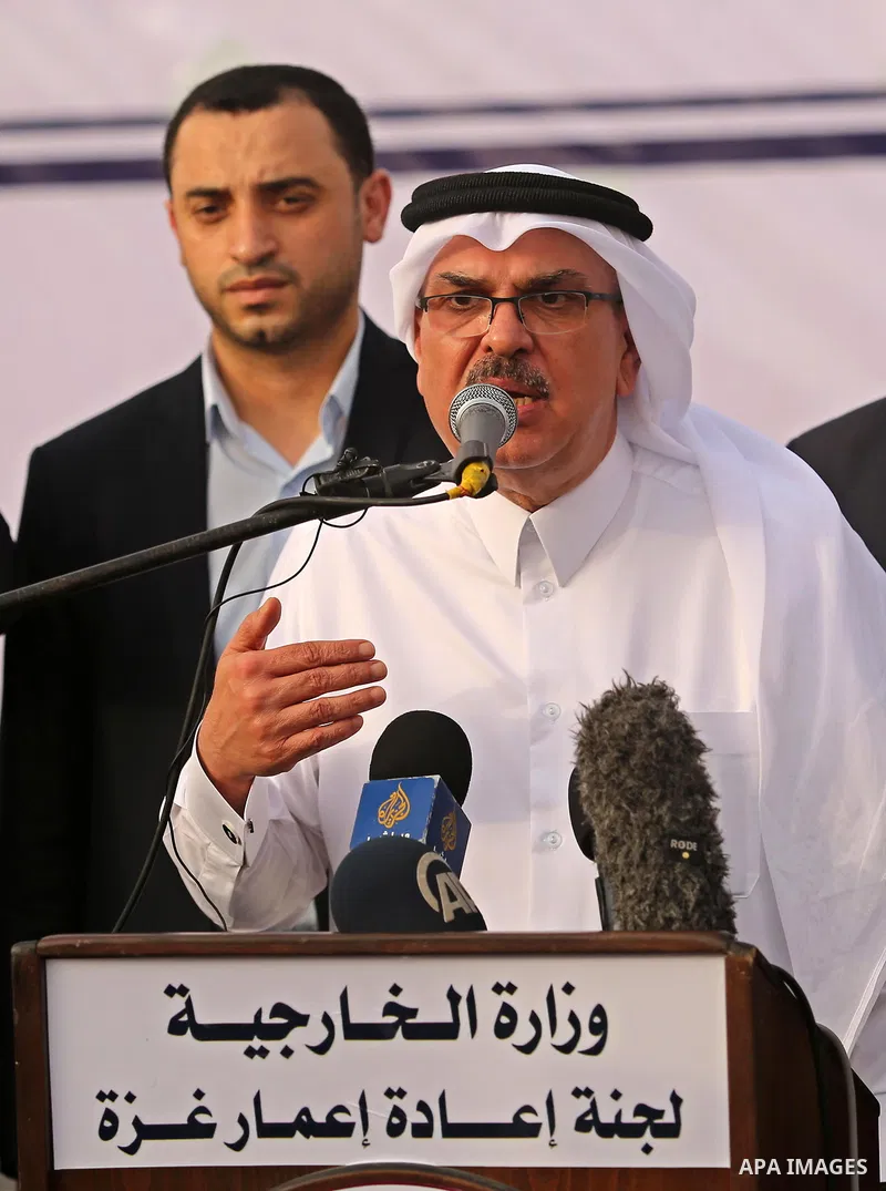 Qatar's Ambassador to the Palestinian Authority, Mohammed Al Emadi speaks during the opening ceremony of rebuild Salah Al-Deen street project -Phase IV- funded by Qatar in al-Nusairat in the center of Gaza strip, on July...