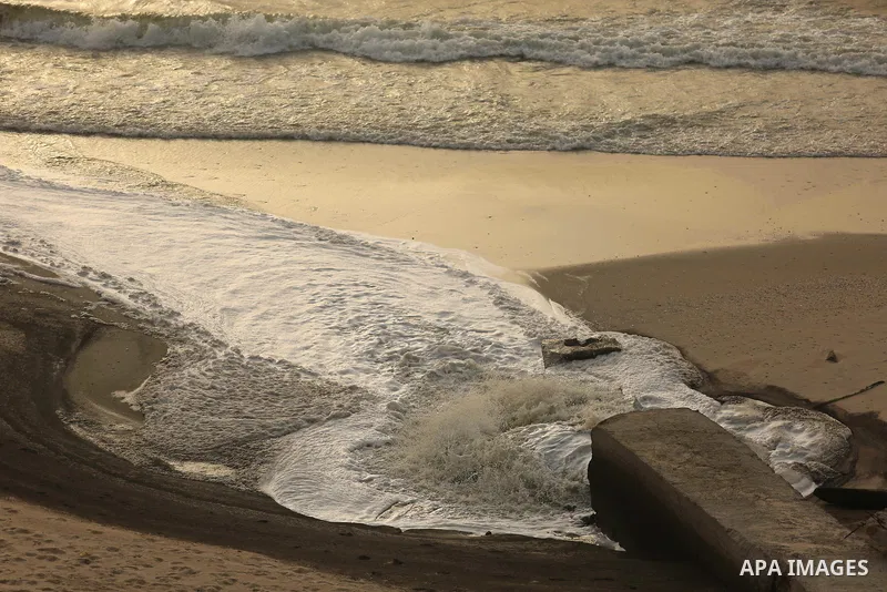 Sewage flows from an outlet into the sea in front of the coast of Gaza city, in July 11, 2017. An immediate consequence of the electricity cuts has been suffering for Gazans. A new U.N. report said Gaza gets electricity...