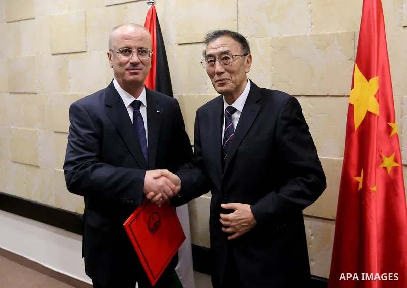 Palestinian Prime Minister, Rami Hamdallah, meets with Vice chairman of the Standing Committee of the National People's Congress (NPC) Kiang Bunkog, in the West bank city of Ramallah, on July 12, 2017. Photo by Prime Min...