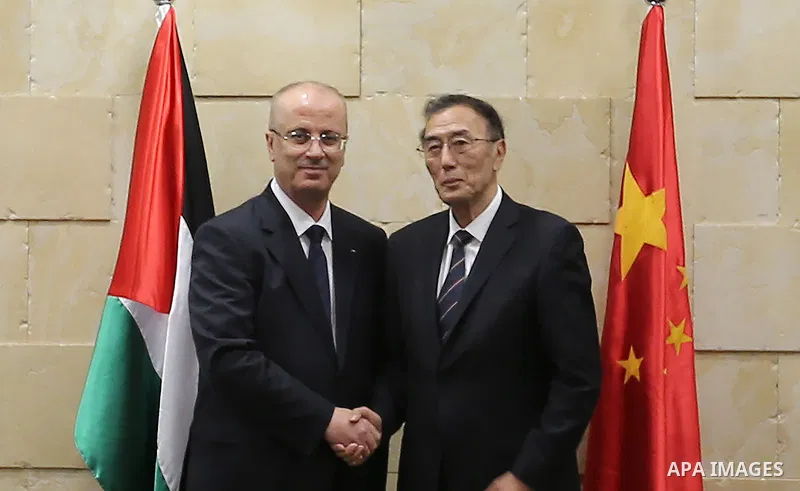 Palestinian Prime Minister, Rami Hamdallah, meets with Vice chairman of the Standing Committee of the National People's Congress (NPC) Kiang Bunkog, in the West bank city of Ramallah, on July 12, 2017. Photo by Prime Min...
