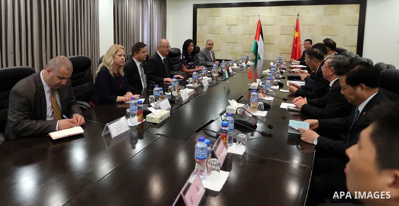 Palestinian Prime Minister, Rami Hamdallah, meets with Vice chairman of the Standing Committee of the National People's Congress (NPC) Kiang Bunkog, in the West bank city of Ramallah, on July 12, 2017. Photo by Prime Min...