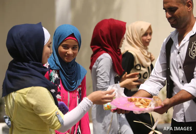 Palestinian high school female students celebrate after heard their results of final exams known as "Tawjihi", in Gaza city on July 12, 2017. Photo by Ashraf Amra