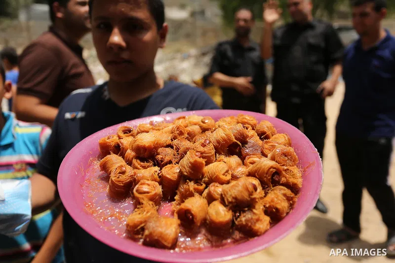 Palestinians celebrate after heard the results of final exams known as "Tawjihi", in Gaza city on July 12, 2017. Photo by Ashraf Amra