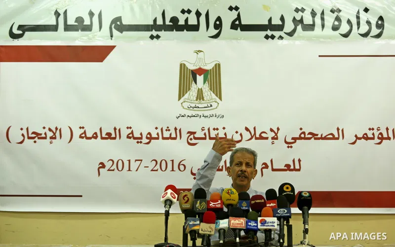 Director General of high school examinations in Gaza Strip, Marwan Sharaf, speaks during a press conference to announce the results of the final high school exams known as "Tawjihi"', in Gaza city on July 12, 2017. Photo...