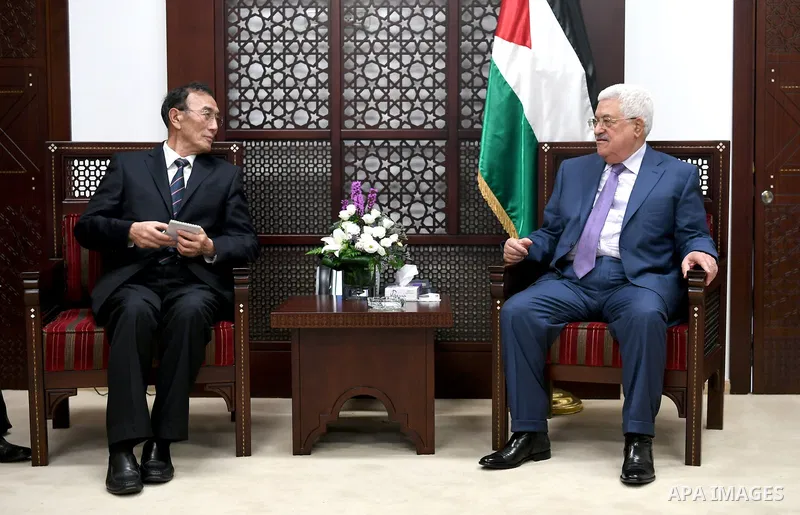 Palestinian President Mahmoud Abbas meets with Vice chairman of the Standing Committee of the National People's Congress (NPC) Kiang Bunkog, in the West bank city of Ramallah, on July 12, 2017. Photo by Osama Falah