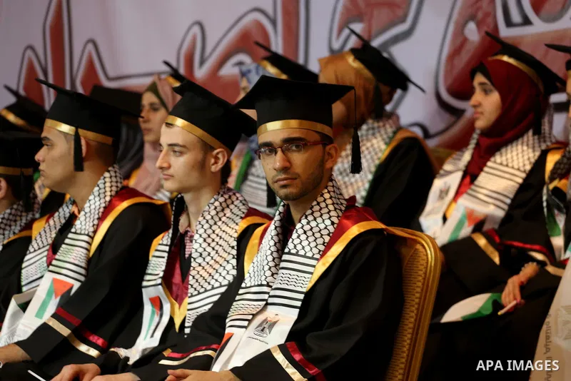 Palestinian top students attend their honoring ceremony after heard the results of their final exams known as ''Tawjihi'' organized by the Ministry of Education, in Gaza city, on July 21, 2017. Photo by Mohammed Asad