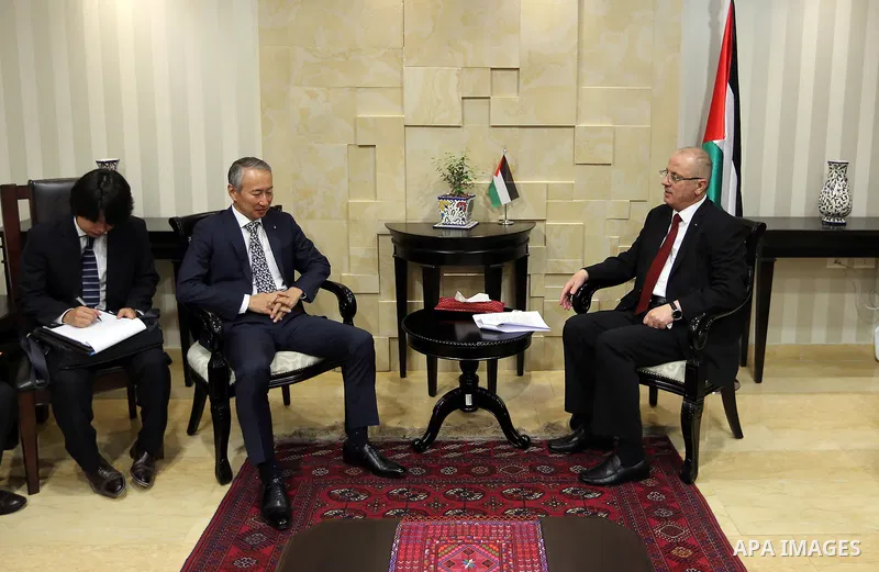 Palestinian Prime Minister Rami Hamdallah meets with a delegation of Japanese businessmen, at his office in the West Bank city of Ramallah on July 13, 2017. Photo by Prime Minister Office