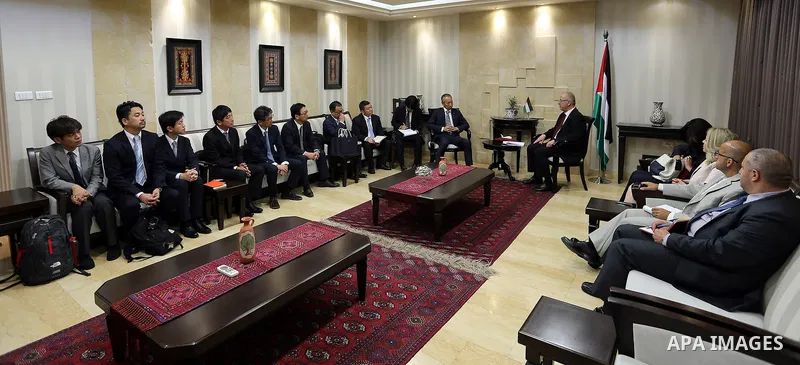Palestinian Prime Minister Rami Hamdallah meets with a delegation of Japanese businessmen, at his office in the West Bank city of Ramallah on July 13, 2017. Photo by Prime Minister Office