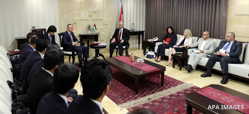 Palestinian Prime Minister Rami Hamdallah meets with a delegation of Japanese businessmen, at his office in the West Bank city of Ramallah on July 13, 2017. Photo by Prime Minister Office