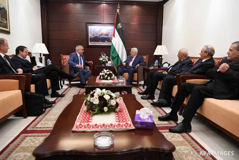 Palestinian President Mahmoud Abbas meets with Russian President's envoy to the Middle East at his office, in the West Bank city of Ramallah, on July 13, 2017. Photo by Osama Falah