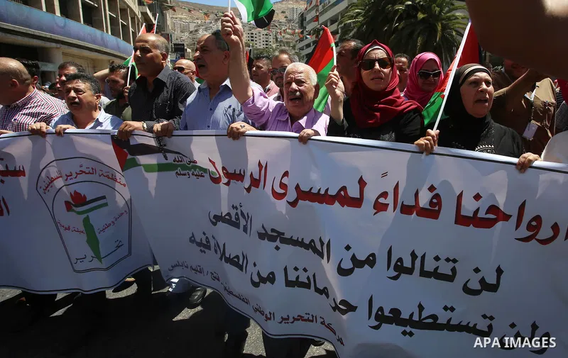 Palestinian protesters chant slogans during a demonstration against the recent closure of the Al-Aqsa Mosque compound by Israel, in the West Bank City of Nablus July 16, 2017. Photo by Ayman Ameen