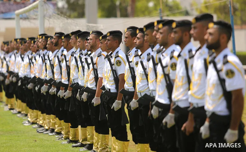 Palestinian policemen take part in a graduation ceremony, in Gaza City on July 17, 2017. Photo by Ashraf Amra