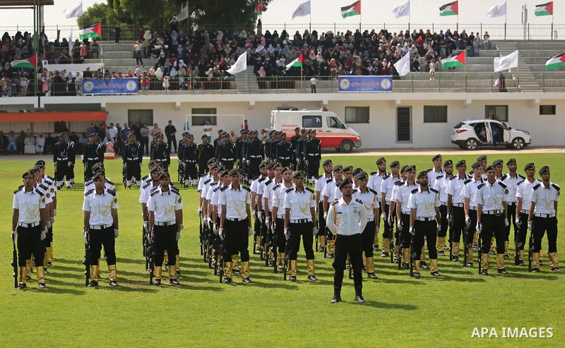 Palestinian policemen take part in a graduation ceremony, in Gaza City on July 17, 2017. Photo by Ashraf Amra