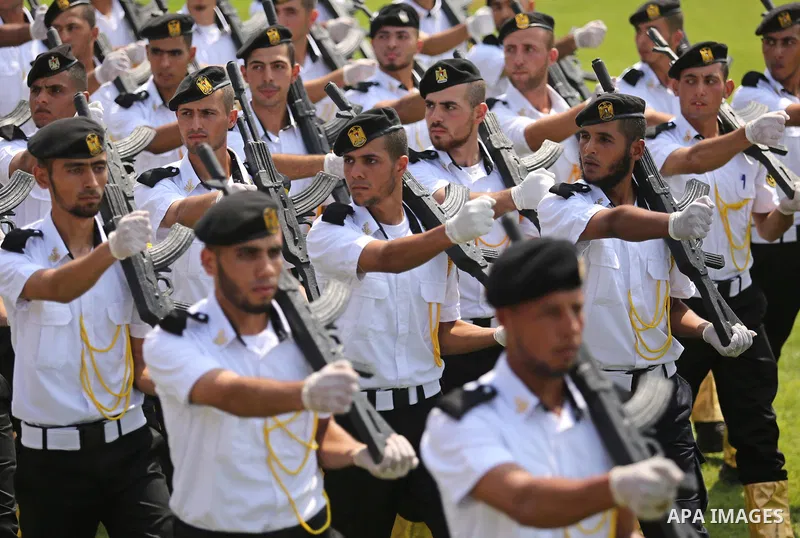 Palestinian policemen take part in a graduation ceremony, in Gaza City on July 17, 2017. Photo by Ashraf Amra