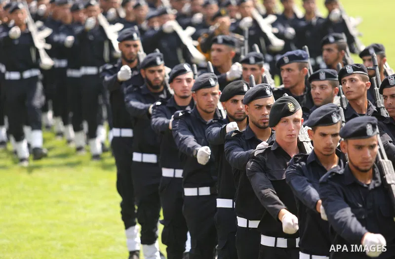 Palestinian policemen take part in a graduation ceremony, in Gaza City on July 17, 2017. Photo by Ashraf Amra