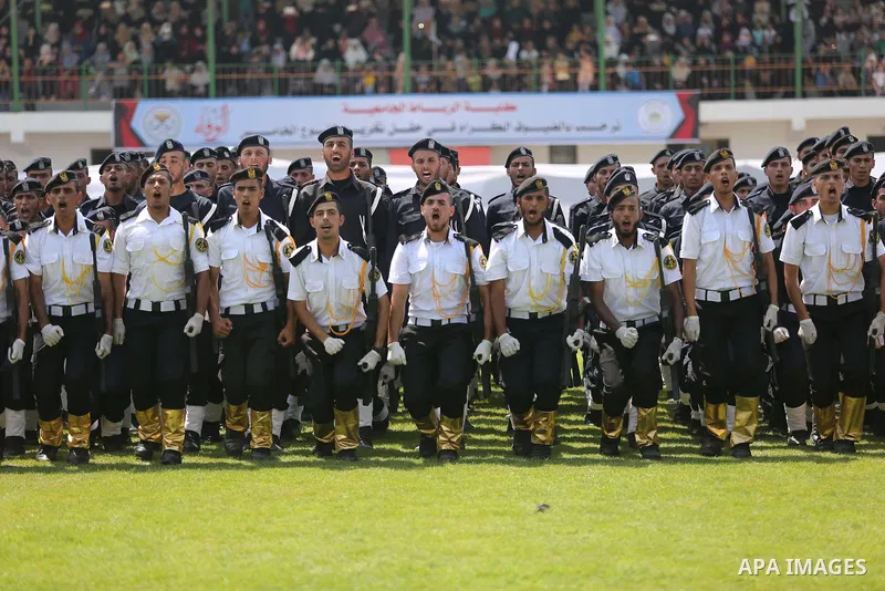 Palestinian policemen take part in a graduation ceremony, in Gaza City on July 17, 2017. Photo by Ashraf Amra