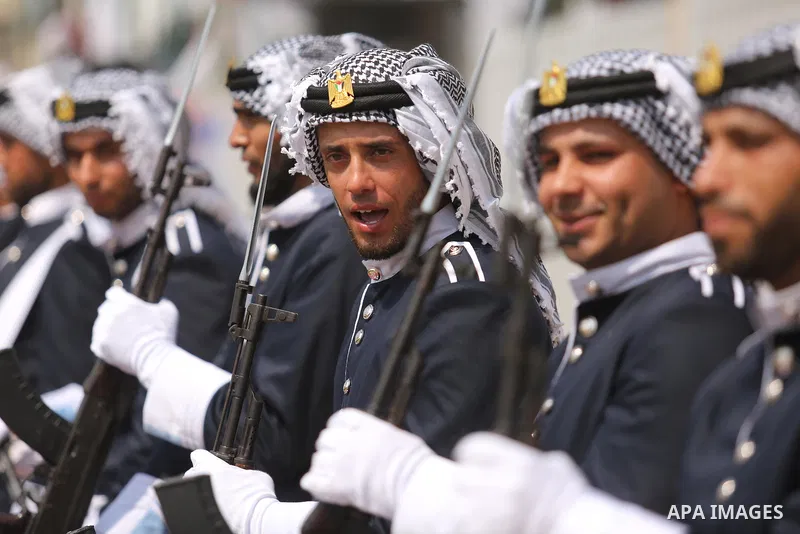 Palestinian policemen take part in a graduation ceremony, in Gaza City on July 17, 2017. Photo by Ashraf Amra