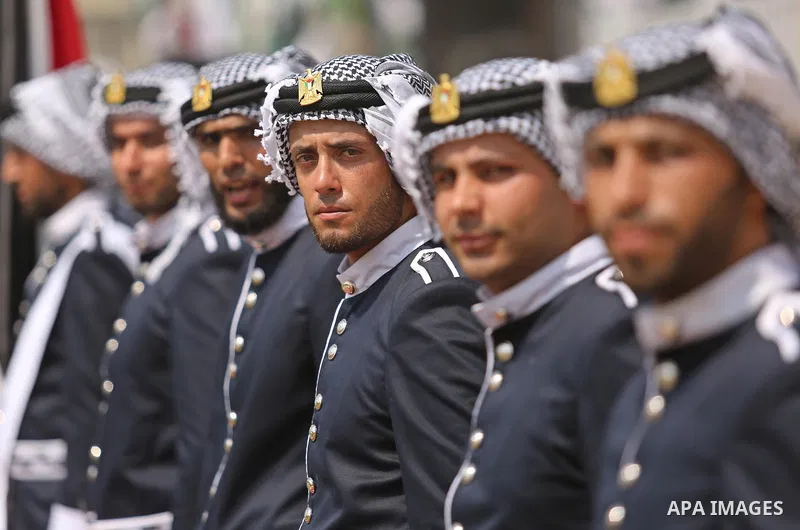 Palestinian policemen take part in a graduation ceremony, in Gaza City on July 17, 2017. Photo by Ashraf Amra